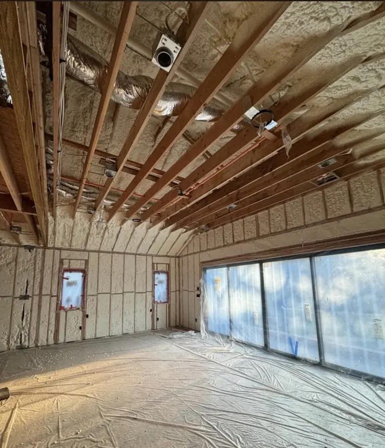 Interior walls and ceiling insulated with spray foam during new construction in Haysville